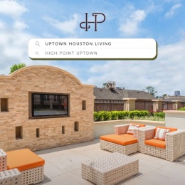 an outdoor lounge area with a fireplace